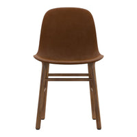 Brown upholstered chair with a smooth, solid surface and natural wood legs, creating a minimalist look.