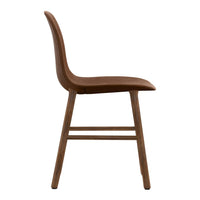 Side view of a sleek brown chair with a smooth finish and simple, clean lines on a wooden frame.