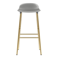 Stylish gray bar stool with a smooth finish and elegant gold metal legs, perfect for modern decor.