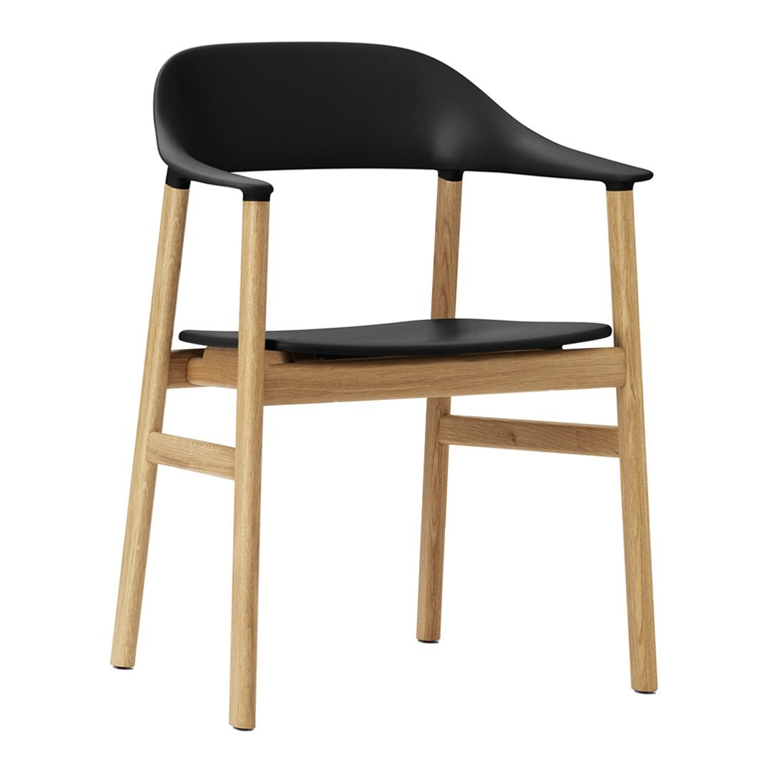 Black modern chair with a smooth finish and natural wood legs, featuring a minimalist design.