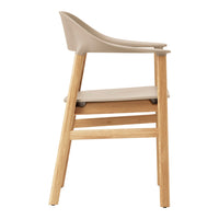 Beige chair with a sleek design and natural wood legs, showcasing modern minimalism and neutral tones.