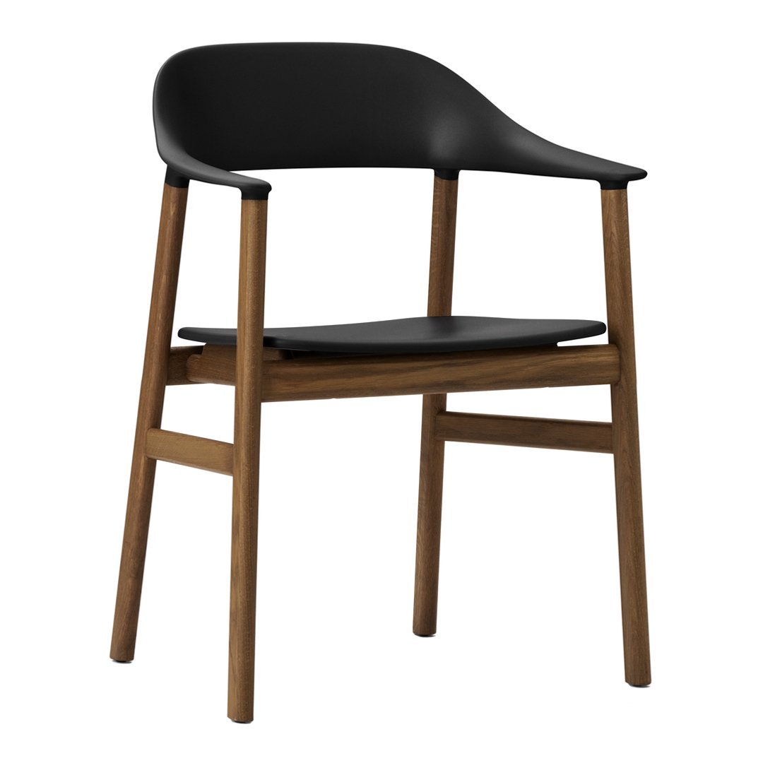 Black modern chair with a sleek design and light wooden legs, featuring smooth finishes and minimalistic styles.