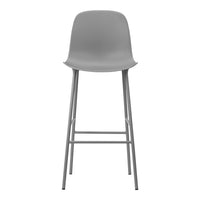 Gray bar stool with smooth surface and minimalist design, featuring a lightweight metal frame. Perfect for modern decor.