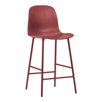 Red matte bar stool with sleek, minimalist design and no visible patterns. Ideal for modern decor.
