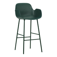 Green plastic bar stool with a sleek design and minimalist metal legs, perfect for modern interiors.