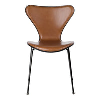 Brown leather chair with a unique butterfly shape and sleek black metal legs, adding a modern touch to any space.