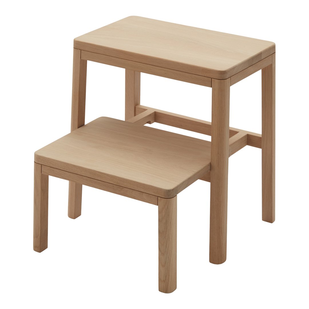 Natural wood step stool with a smooth, light finish and clean, minimalist design. Ideal for various home settings.