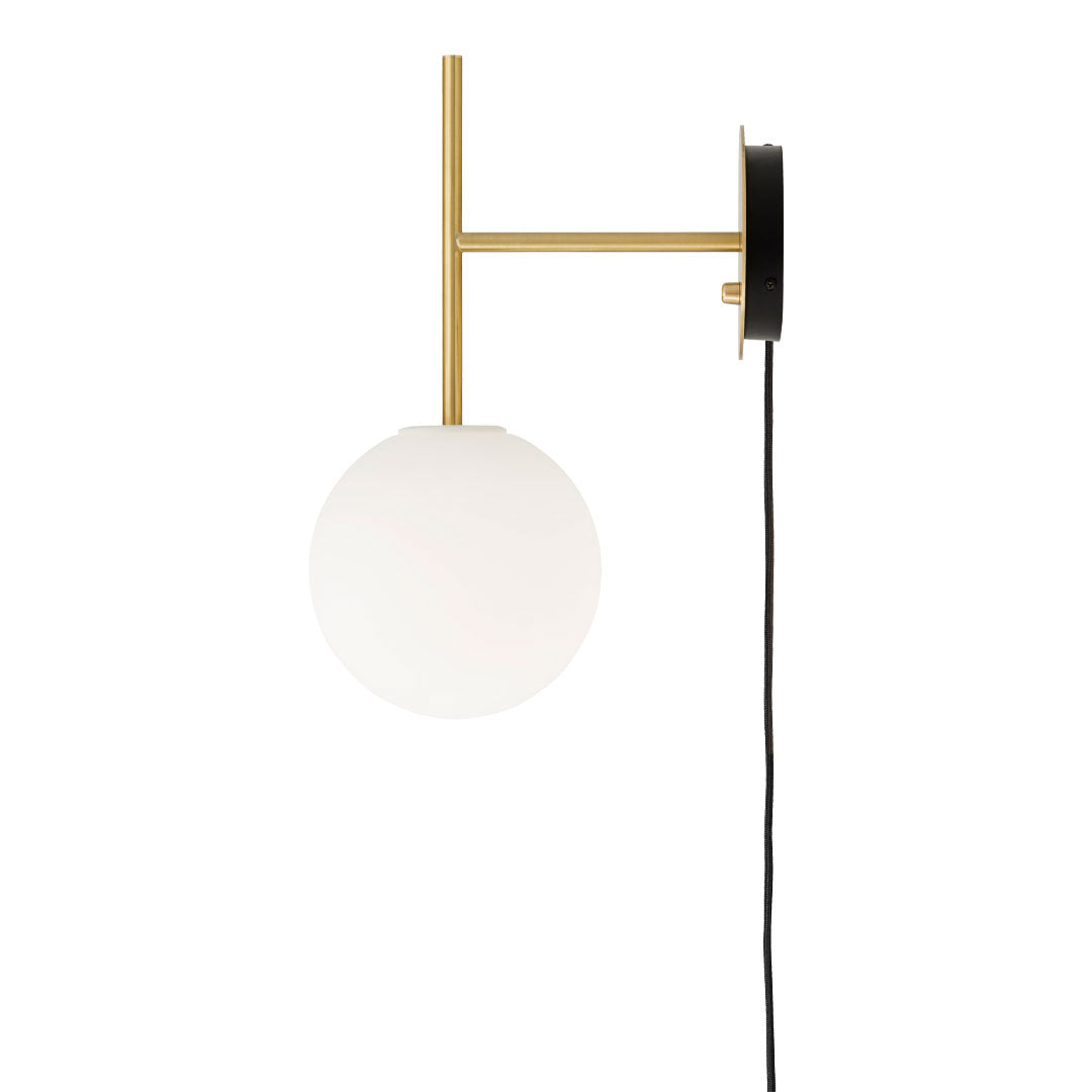 "Elegant brass wall lamp with a frosted white globe and sleek black accents, perfect for modern decor."