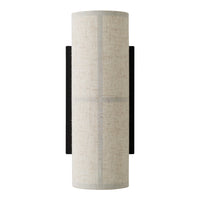 Light beige cylindrical lamp with subtle texture and black accents, featuring a minimalist design.