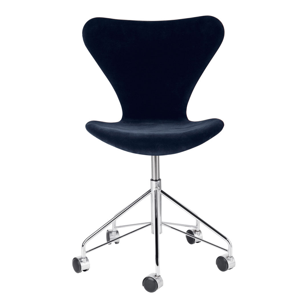 Black velvet office chair with a sleek chrome base and smooth wheels, featuring a modern, minimalist design.