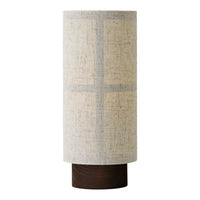 Beige cylindrical lamp with subtle gray cross pattern and a dark wooden base. Perfect for modern decor.
