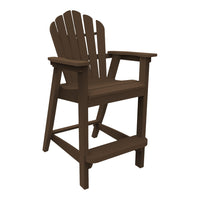 "Brown Adirondack-style high chair with slatted back and armrests, perfect for outdoor settings."