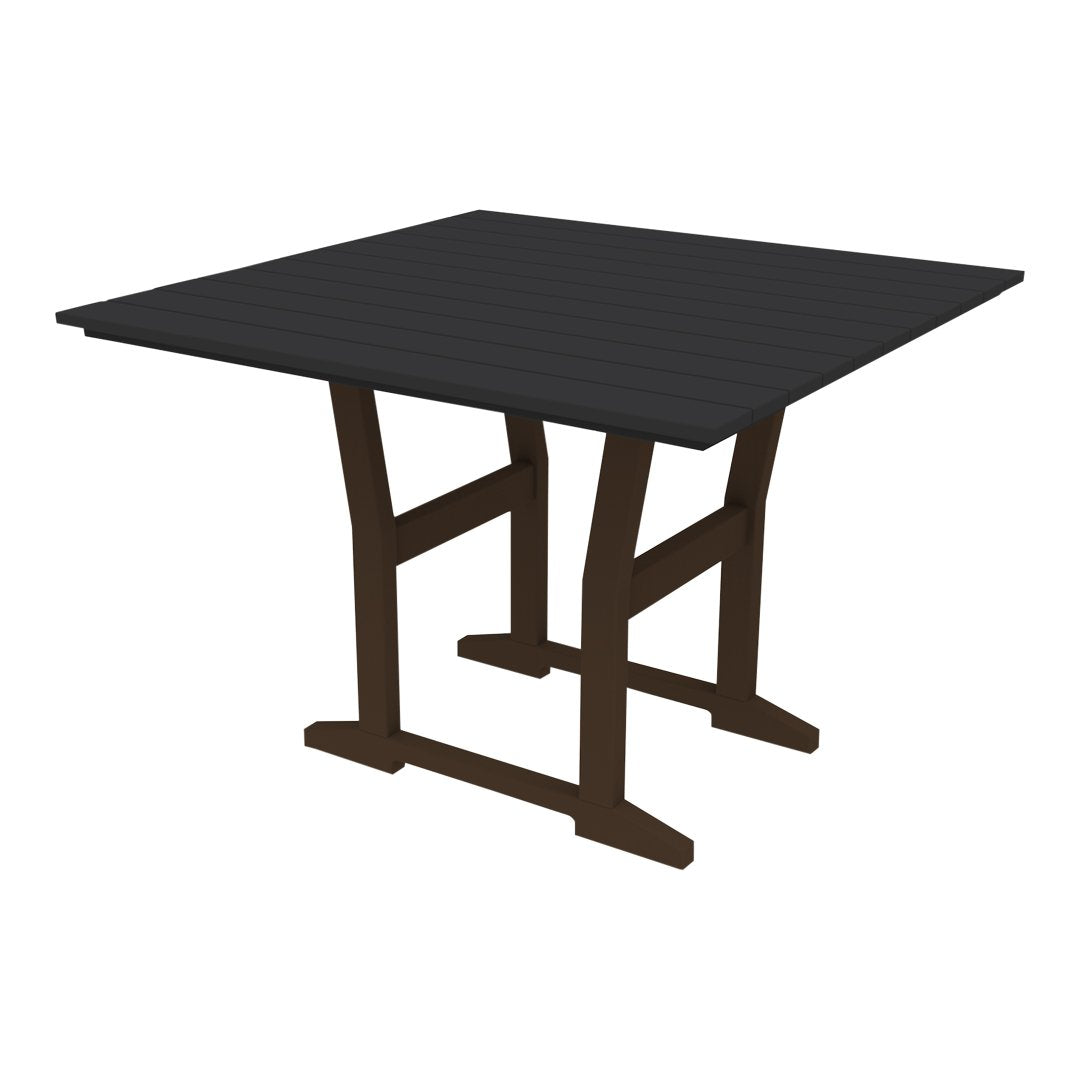 Square table with a sleek black top and contrasting brown legs, featuring a minimalist design. Perfect for modern decor.