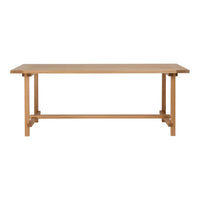 Natural wood dining table in a light oak finish with a smooth surface and minimalistic design.