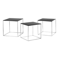 "Set of three modern black square side tables with sleek metal frames, featuring a minimalist design."