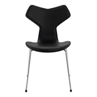 Black chair with a unique, modern Y-shaped backrest and sleek chrome legs, featuring a minimalist design.