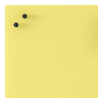 Bright yellow surface with two black knobs, featuring a smooth, modern design for a pop of color.