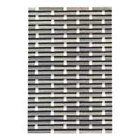 Black and white patterned rug featuring a geometric, grid-like design with alternating stripes.