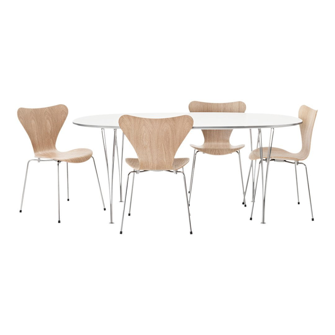 Light wood dining table set with white tabletop and minimalist design; features natural wood grain in chair patterns.