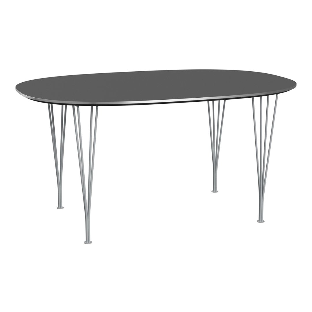 Sleek oval black table with silver metal legs, featuring a minimalist modern design. Perfect for contemporary spaces.