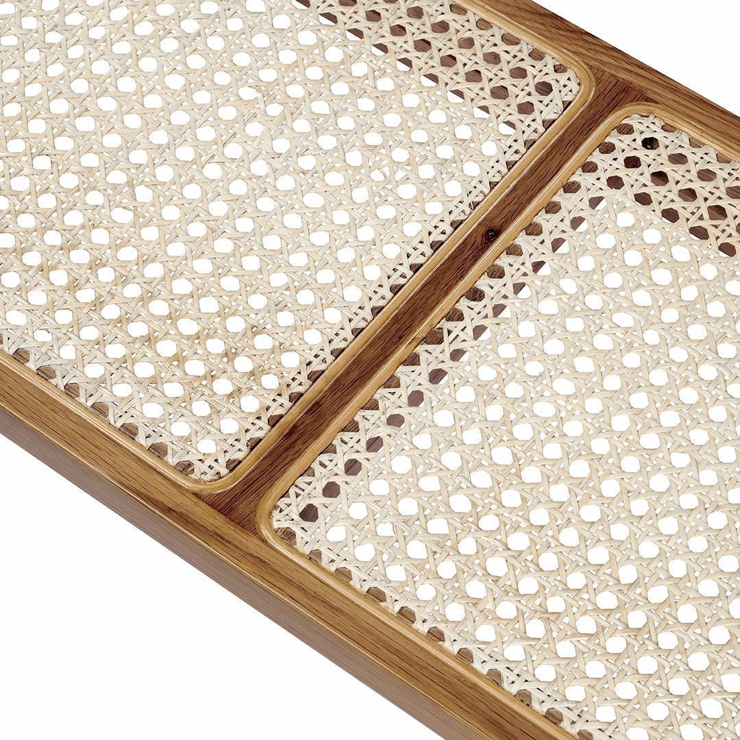 Bamboo tray with intricate beige rattan pattern featuring circular cutouts and textured surfaces.