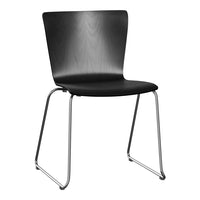 Black chair with a sleek, smooth finish and chromed metal legs, showcasing a modern minimalist design.