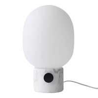 White frosted glass lamp shade with a speckled gray marble base and a black accent.
