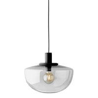 Clear glass pendant lamp with a sleek black ceiling mount and an exposed bulb, offering a modern minimalist design.