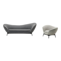 Grey upholstered sofa and chair set with sleek curves and black metal legs, featuring a subtle textured pattern.