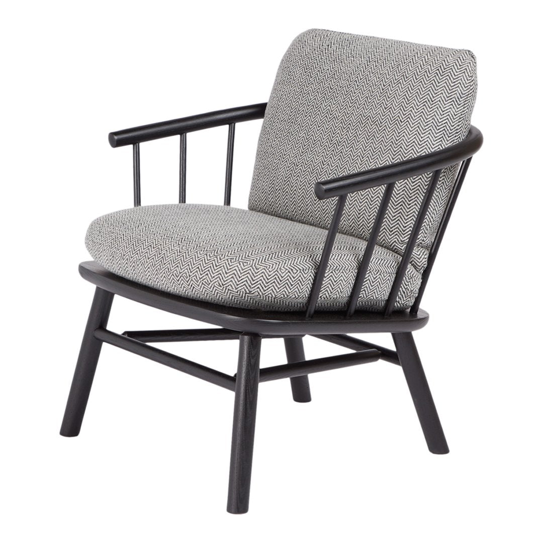 Gray upholstered chair with black wooden frame and sleek, minimalist design. Perfect for modern decor.