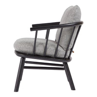 Side view of a modern chair with a black wooden frame and a textured gray upholstery. Stylish and contemporary design.