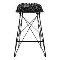 Black woven bar stool with a minimalist design and an intricate pattern on the seat.