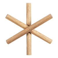 Natural oak wooden sticks arranged in a star pattern, showcasing a warm, earthy tone.