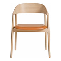 Light wood chair with a smooth, tan leather seat. Minimalist design with natural tones and clean lines.