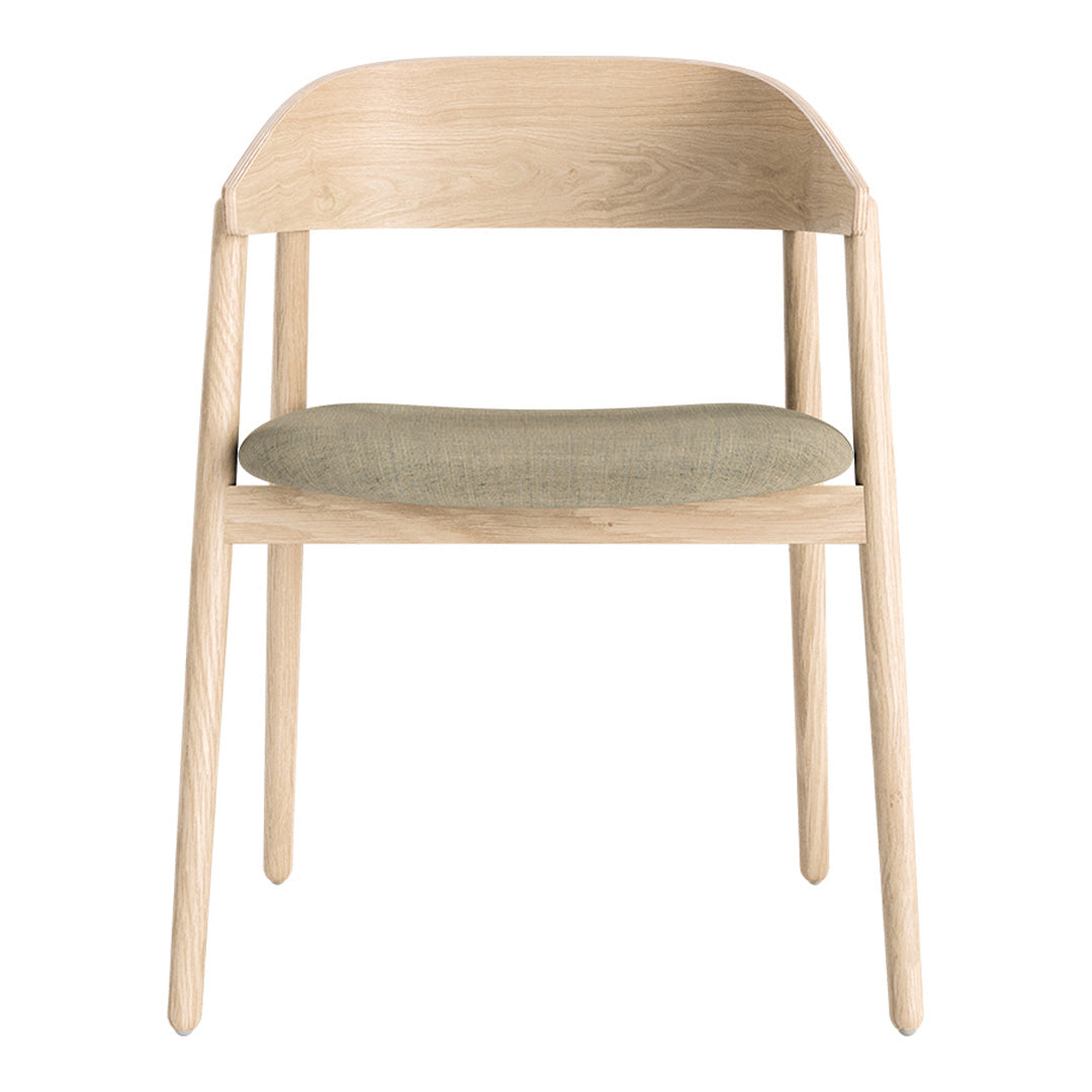 Light wood chair with a natural finish and a soft, muted green upholstered seat. Simple and modern design elements.