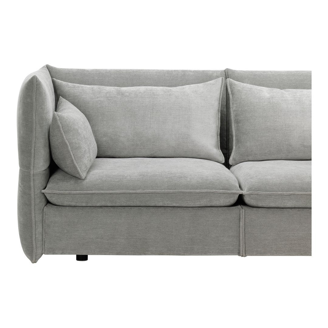 Stylish gray sofa with soft, textured upholstery and plush cushions for a modern look. Ideal for any living space.