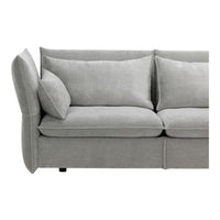 Soft gray sofa with plush cushions and a smooth, modern texture, featuring clean lines and minimalistic design.