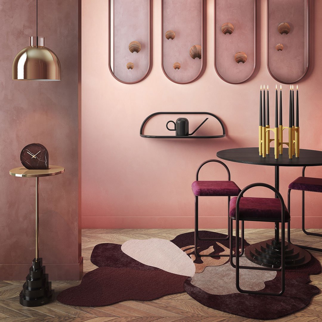 Elegant pink walls with circular patterns, paired with a textured, abstract rug in shades of burgundy, cream, and black.