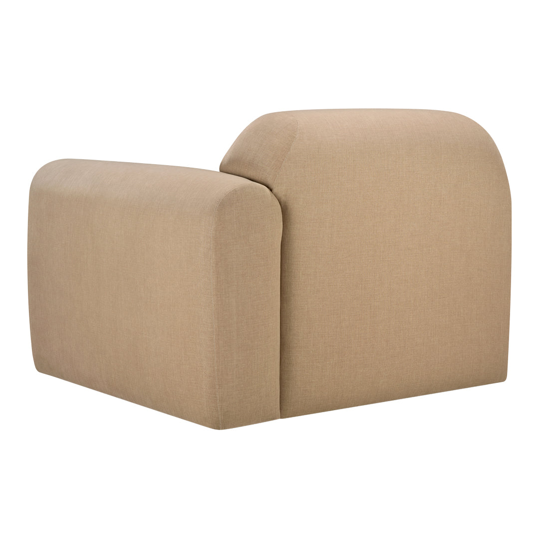 Beige upholstered corner chair with a smooth, textured fabric and rounded edges. Ideal for modern decor.
