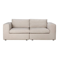 Light beige contemporary sofa with smooth, minimalistic design and subtle texture. Perfect for modern spaces.