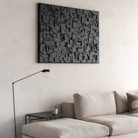 Abstract black wall art featuring geometric shapes and textured patterns, perfect for modern decor.