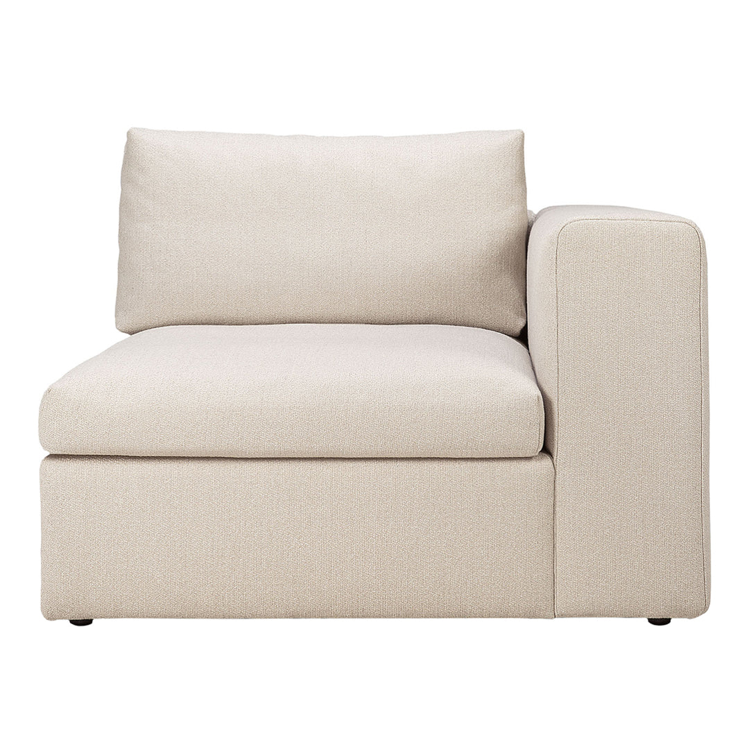 Beige upholstered corner sofa with a modern design and subtle texture, perfect for stylish living spaces.