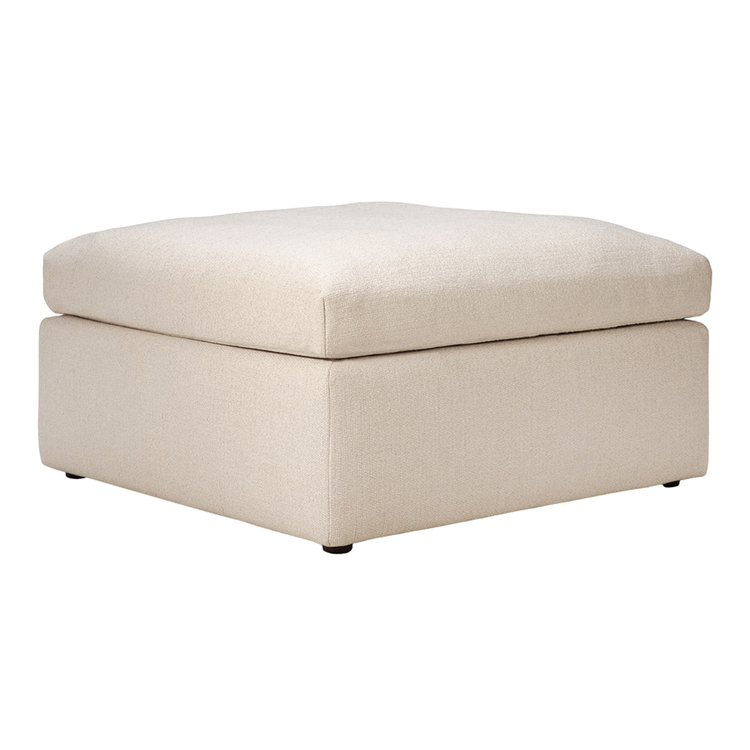 Cream-colored upholstered ottoman with a smooth, solid pattern and rounded corners. Ideal for modern decor.
