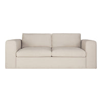 Beige sofa with a smooth, textured fabric and contemporary design, featuring simple lines and a minimalist style.