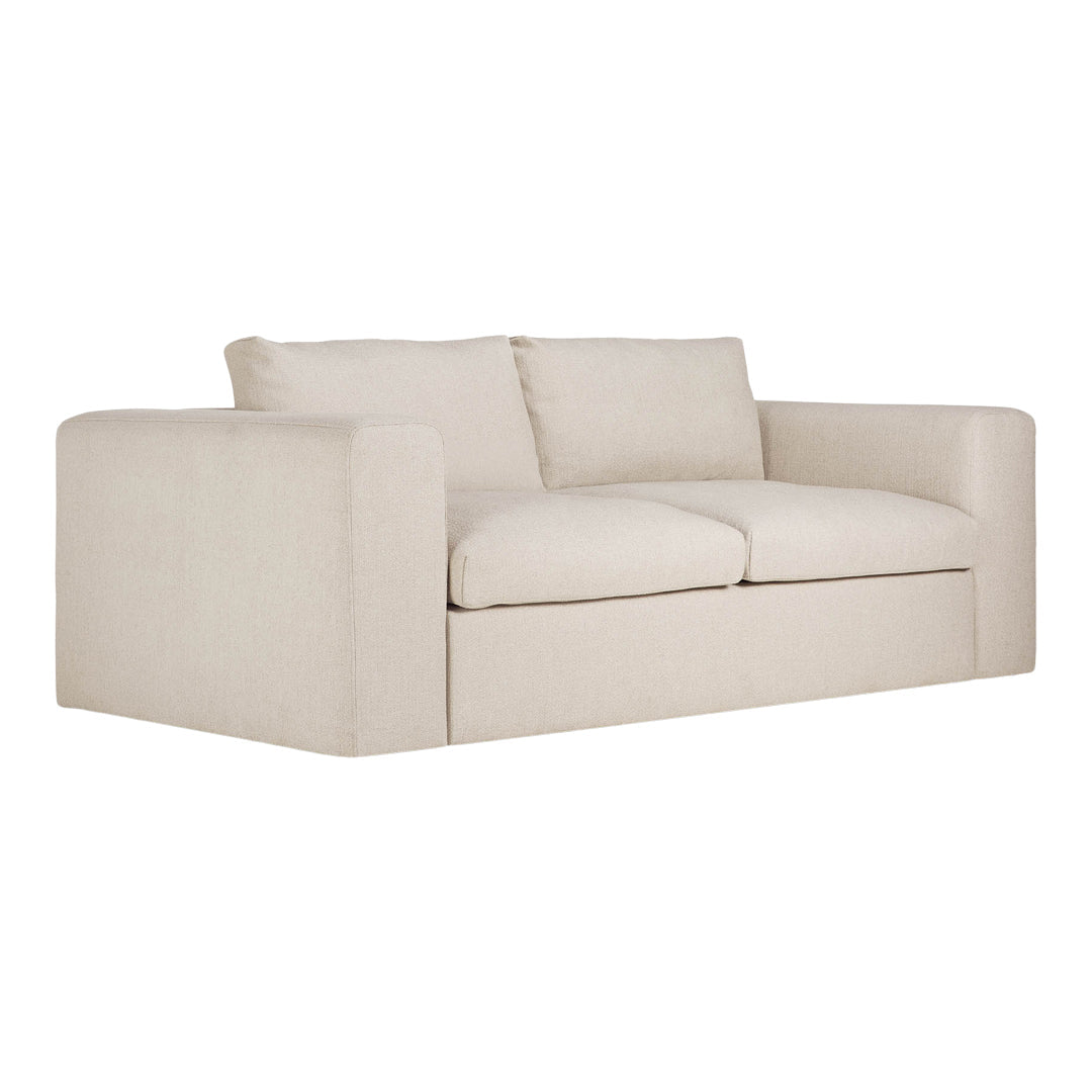 Beige modern sofa with clean lines and a minimalist design, featuring soft, solid upholstery. Perfect for contemporary spaces.