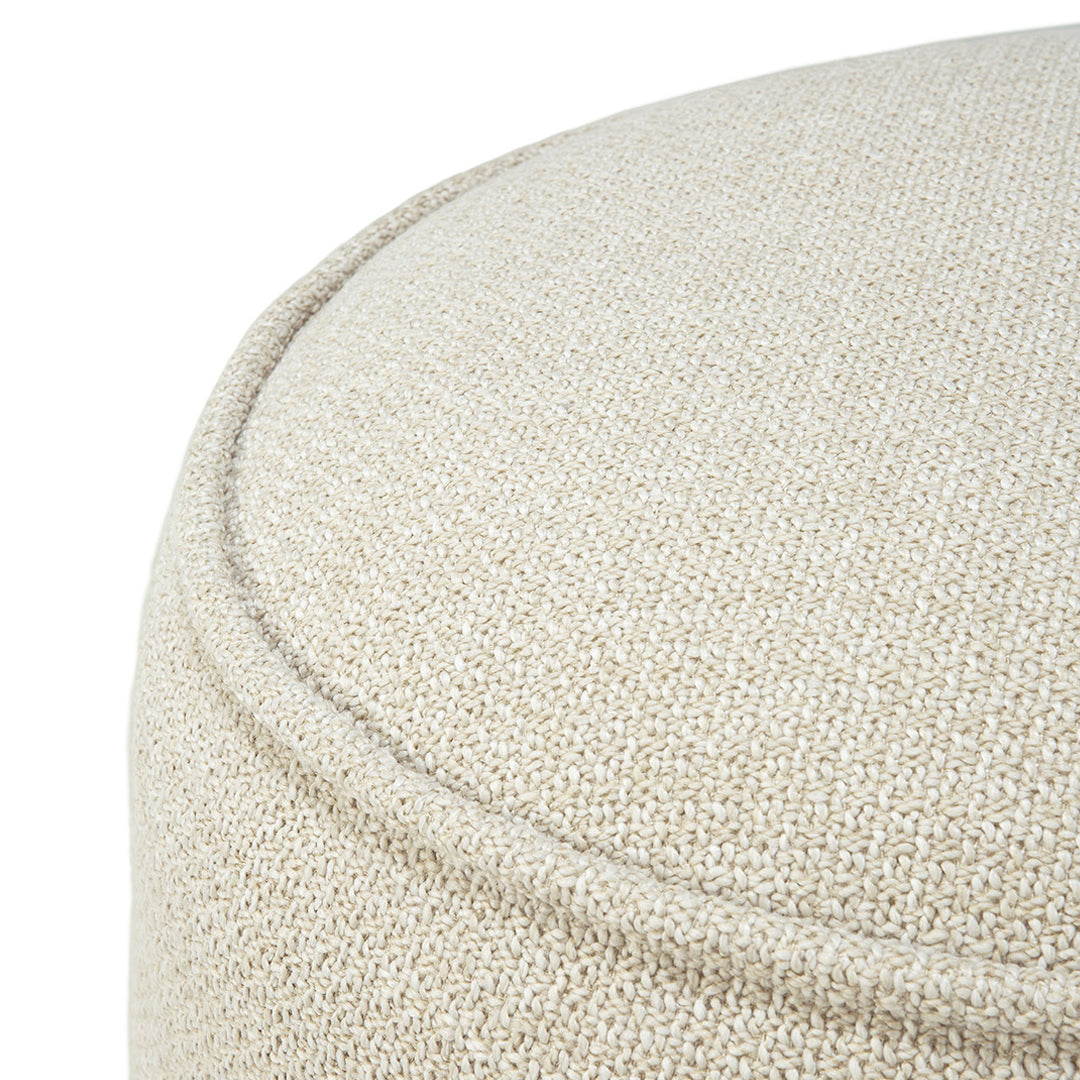 Beige textured fabric with subtle woven patterns, showcasing a soft, organic feel. Perfect for modern decor.