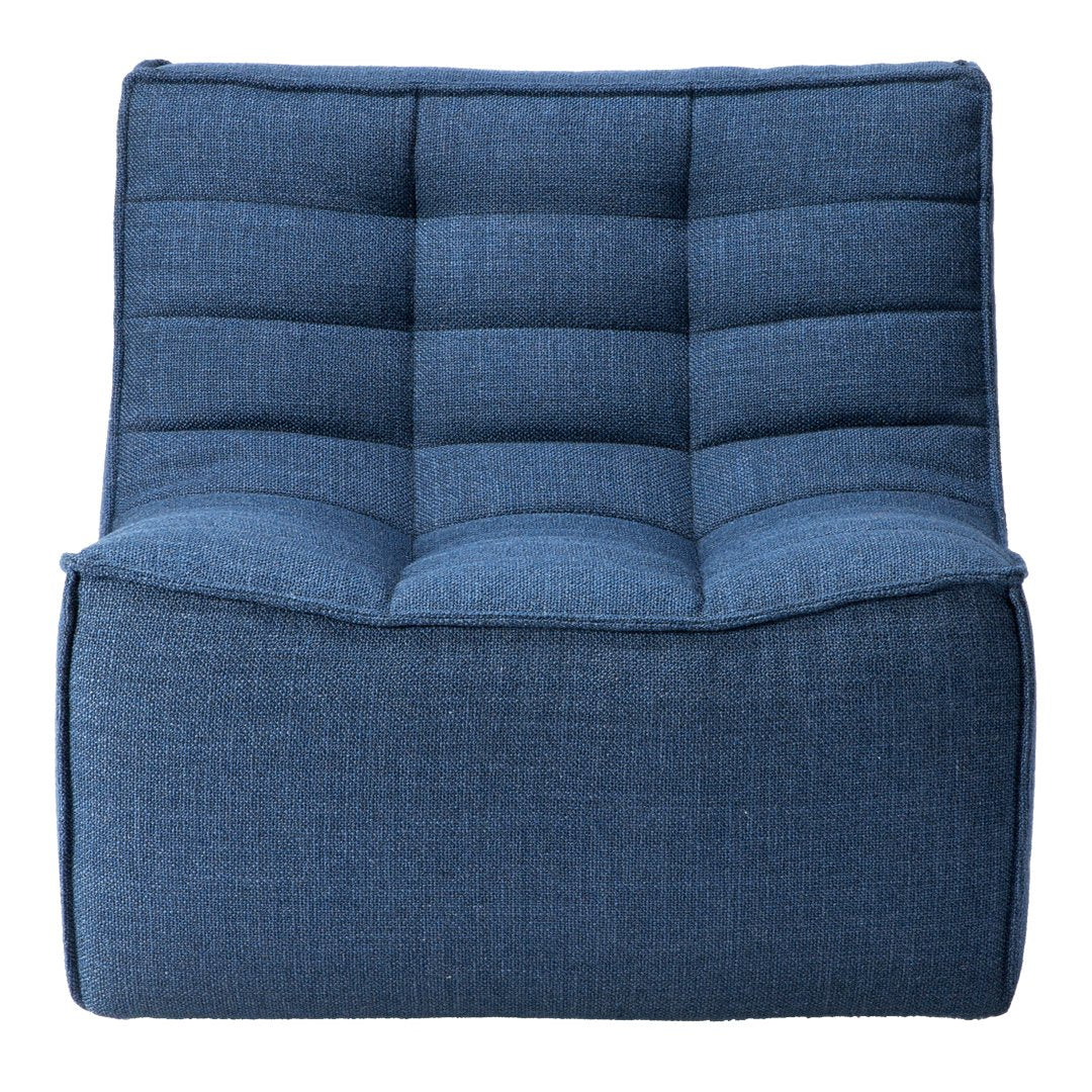Blue upholstered chair with a quilted texture and modern design. Ideal for stylish home decor.