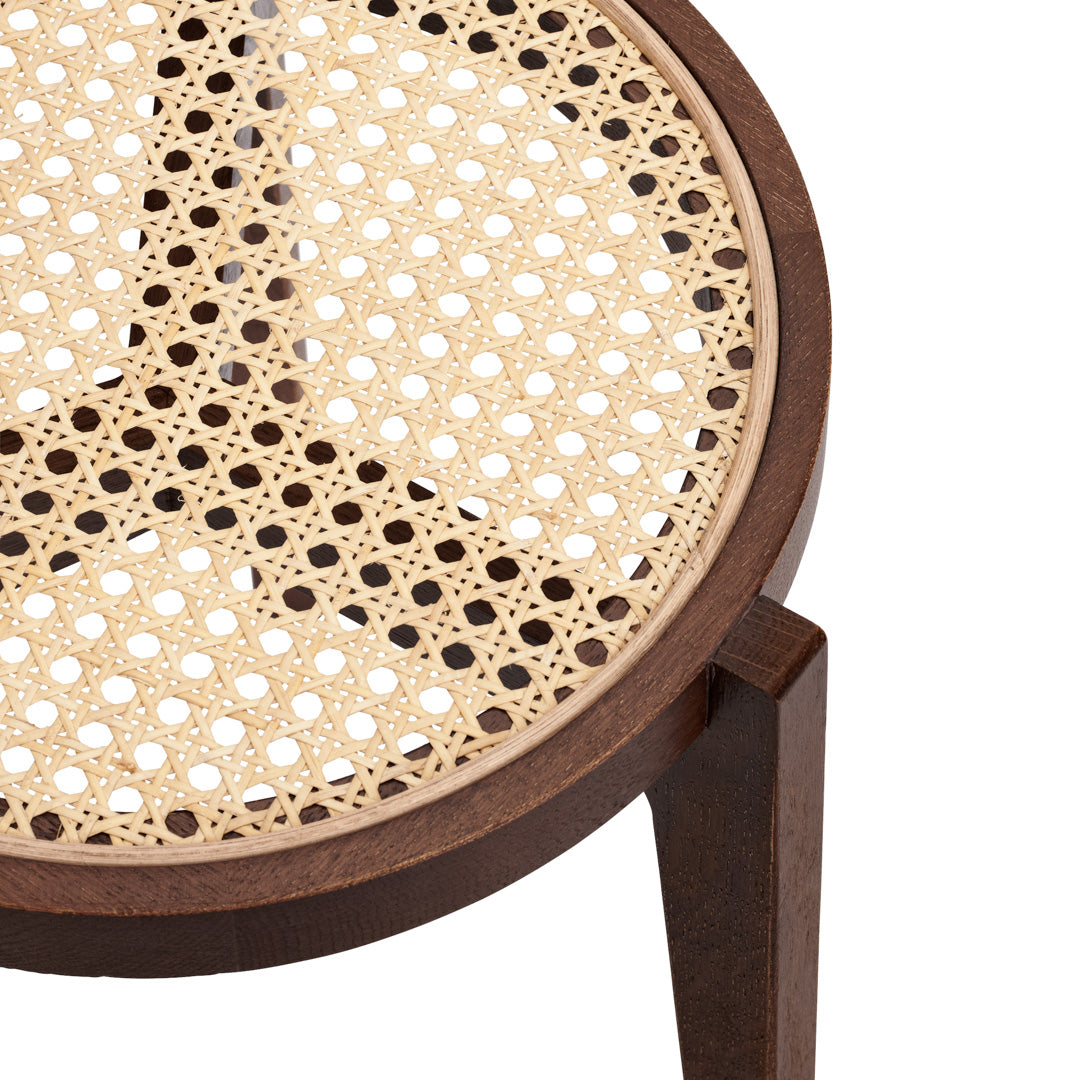 Round wooden stool with a natural rattan seat, featuring a beige woven pattern and a rich brown frame.
