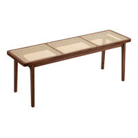 Brown wooden coffee table with woven cane pattern on the top. Elegant and modern design for any living space.