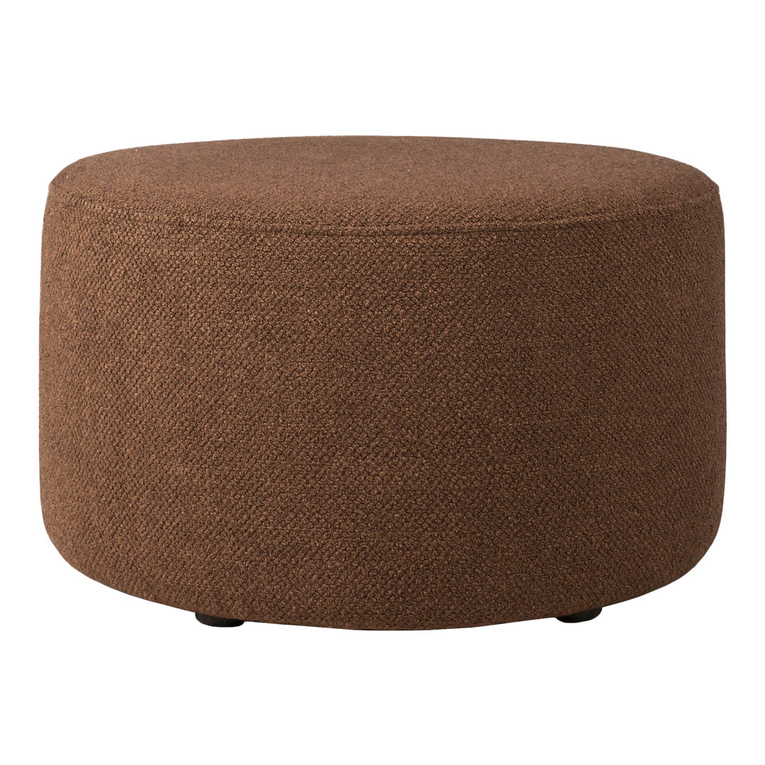 Round brown ottoman with textured fabric, versatile for modern decor.
